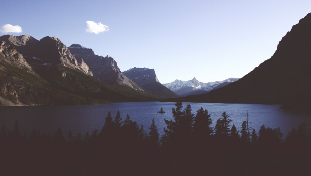 landscape photography of mountain and body of water