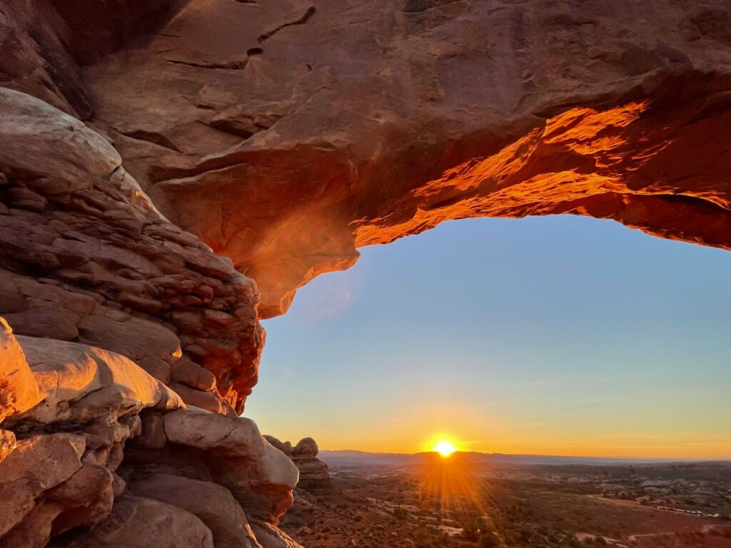 brown rock formation during sunset