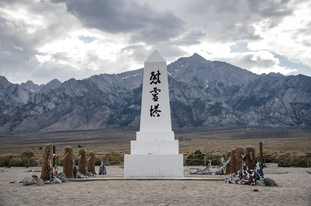 Manzanar Internment Relocation Center, created by Executive Order No9066, Issued February 19. 1942. It was the first of ten, and the total incarcerated would be 110,000 of Japanese Ancestry.