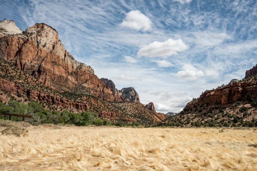 brown rocky mountain under blue sky during daytime