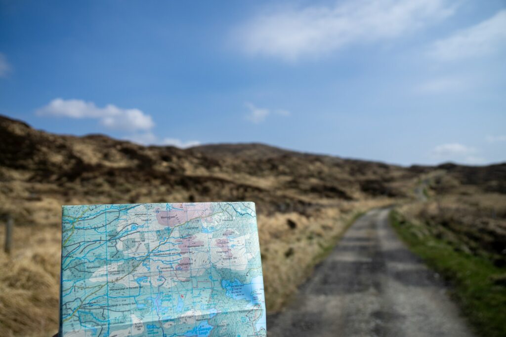 A map sitting on the side of a road