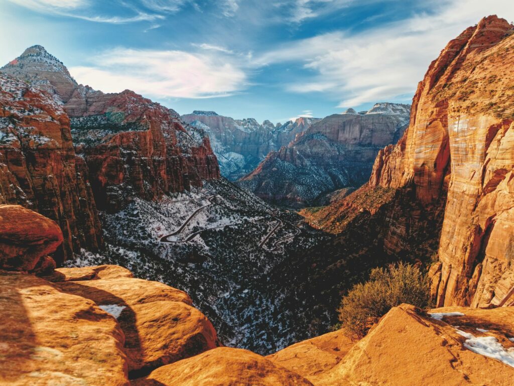 A view of the mountains from the top of a mountain