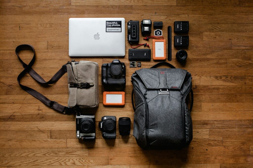 Black DSLR cameras and lenses.