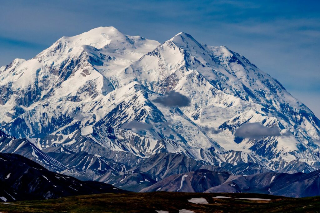 Snow covered mountain during daytime