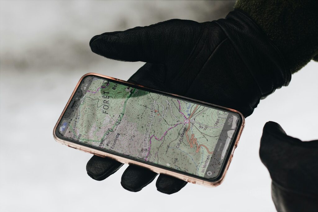 Person holding iphone 6 with case.