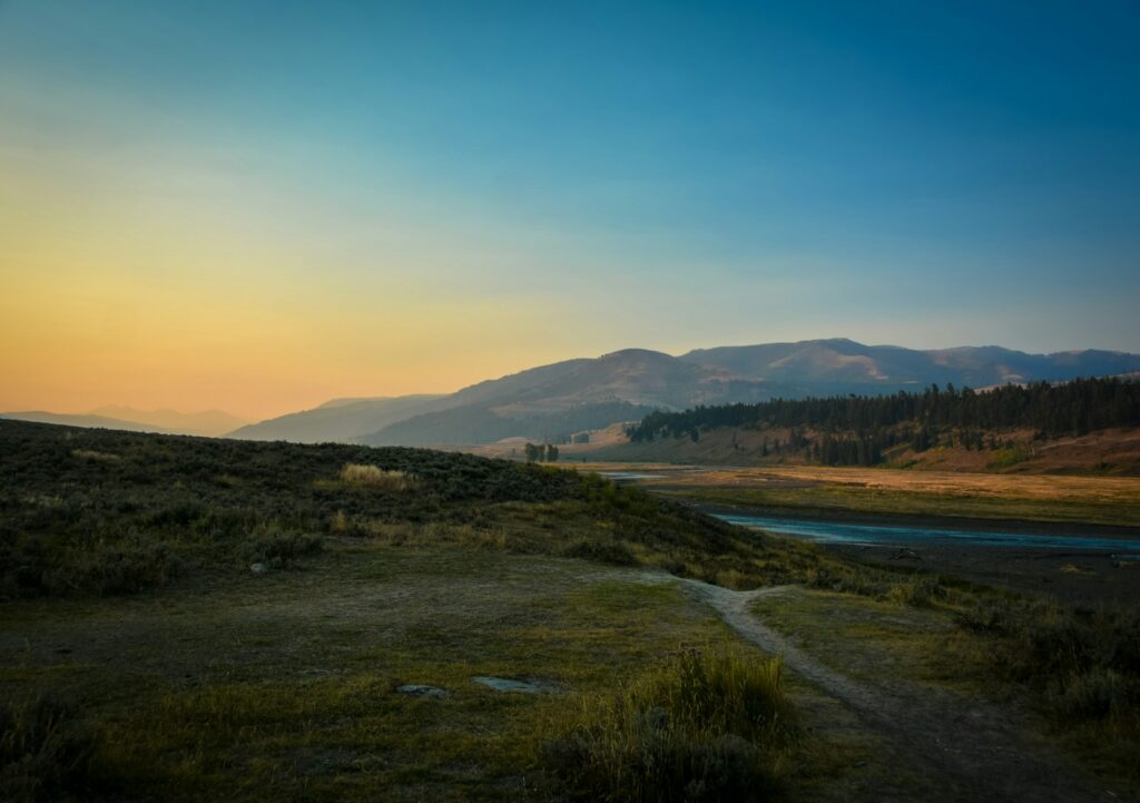 landscape photography of river and mountain