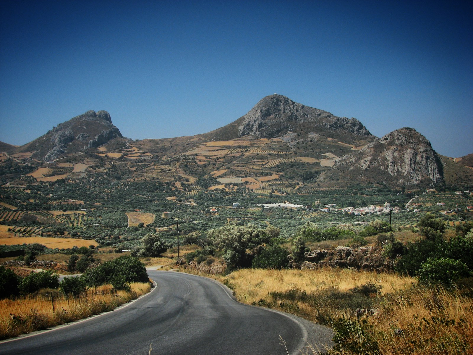 A road in the middle of a mountain range