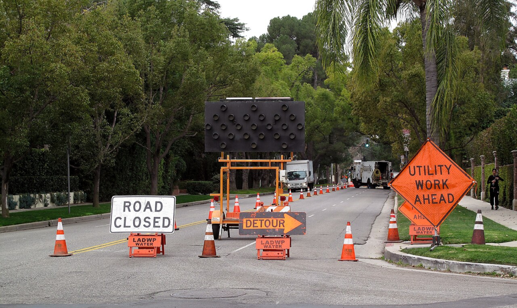 Road closed and other signs