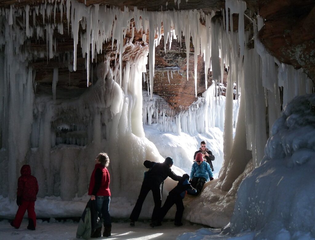 Lake Superior's wave action has eroded shallow caves into the sandstone east of Meyer's Beach. Some winters the lake is stable enough for visitors to walk out to the caves