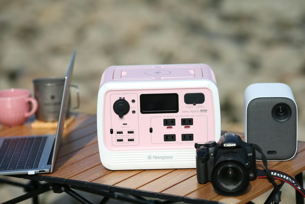 A pink handheld gaming device.