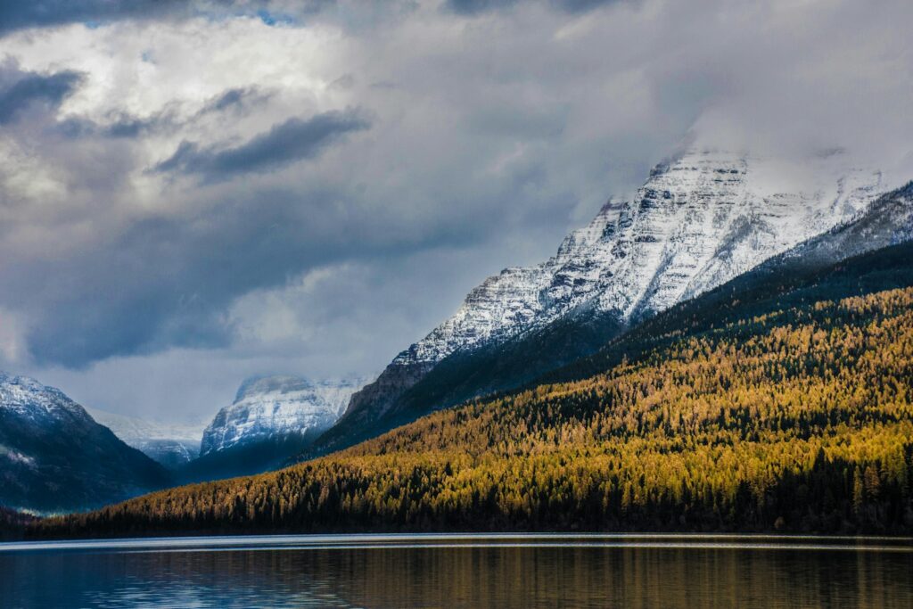 body of water near mountains